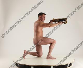 2020 01 MICHAEL NAKED MAN KNEELING POSE WITH GUNS (15)
